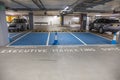 London, UK - September 14, 2023: Reserved parking spot in underground car park Royalty Free Stock Photo