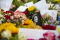 LONDON, UK - September 2022: Thousands of flowers, cards and messages are laid in Green park in tribute to Queen