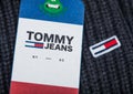 LONDON, UK - SEPTEMBER 09, 2020:Tommy Hilfiger logo and clothing tag on wool fabric Royalty Free Stock Photo
