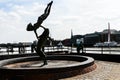 Tower Bridge and St Katharine Docks Girl with a dolphin fountain