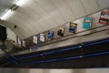 London, UK: stairs and escalator at Whitechapel tube station, District Line