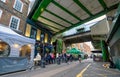 London, UK: Stoney Street next to Borough Market with railway bridges above Royalty Free Stock Photo