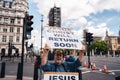 Street preacher outside the British Parliament stating Jeus Christ will return soon during the Black Lives Matters Protest at