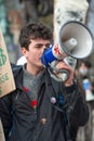 Youth activist with megaphone at the Climate Change demonstration in London.