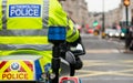 Metropolitan Police motorcycle riders escort a protest demonstration in central London, England. Royalty Free Stock Photo