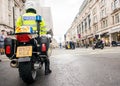 Metropolitan Police motorcycle riders escort a protest demonstration in central London, England. Royalty Free Stock Photo