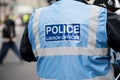 Police liaison officer at a protest demonstration in central London, England.