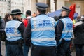 Police liaison officers at a protest demonstration in central London, England.