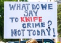 Anti knife crime campaign posters & placards from Operation Shutdown protesting outside the gates of Parliament