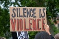 Protesters holding sign at Black Lives Matter protest demonstration in London. Royalty Free Stock Photo