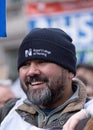 Smiling protester at the SOS NHS National Demo - London, England.