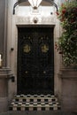 London, UK, 2.09.2020 - Wrought iron door detail, vintage house lattice monogram