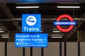 London Underground roundel and Elizabeth line sign at Heathrow Airport