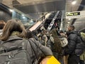 London underground train at rush hour and passengers