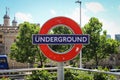 London underground tube sign outside a station, beside the tower of London, UK. Royalty Free Stock Photo