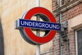 London Underground Tube Station sign on the side of an old brick building Royalty Free Stock Photo