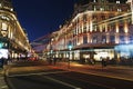 Night scene of London city United Kingdom with the moving red buses and cars - long exposure photography