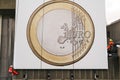 LONDON, UNITED KINGDOM - Apr 01, 2017: London / United Kingdom - April 2017. A giant Euro Coin billboard is being set-up in London