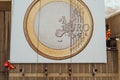 LONDON, UNITED KINGDOM - Apr 01, 2017: London / United Kingdom - April 2017. A giant Euro Coin billboard is being set-up in London