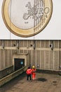 London / United Kingdom - April 2017. A giant Euro Coin billboard is being set-up in London.