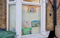 London, United Kingdom - April 04, 2020: Hand drawn rainbow and poster with thank you note to NHS and essential workers displayed