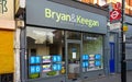 London, United Kingdom - April 04, 2020: STAY HOME & SAFE signs on windows of Bryan & Keegan real estate agency. Most non Royalty Free Stock Photo