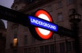 Lit up sign at the entrance of a London metro, tube, or underground station