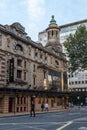 People walk by Shaftesbury Theatre in London, UK