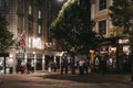 People walking past The Crown pub and shops in Seven Dials, Covent Garden, London, UK Royalty Free Stock Photo