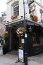 Typical British pub in London, United Kingdom on 26 April, 2015. Pub business in the UK has been declining every year. Royalty Free Stock Photo