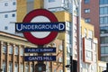 London, United Kingdom. August 22, 2009 - Typical London underground sign, street view background, United Kingdom. Copy space