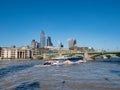 Cityscape of the Thames river on a sunny day with the City Financial district