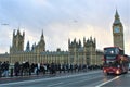 London, United Kingdom - December 2023 - Photo of the double deck bus on the bridge and the Palace of Westminster and Big Ben Royalty Free Stock Photo