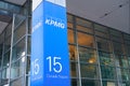 London, United Kingdom - February 03, 2019: Blue KPMG signage at entrance to their offices on 15 Canada Square in Canary Wharf -