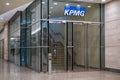 London, United Kingdom - February 03, 2019: Blue KPMG signage at entrance to their offices on 15 Canada Square in Canary Wharf -