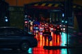 London, United Kingdom - February 01, 2019: Buses and cars stuck waiting in traffic at red light on a rainy evening near Lewisham Royalty Free Stock Photo