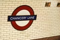 London, United Kingdom - February 01, 2019: Chancery Lane underground station sign at wall of tube stop. Traditional red, white Royalty Free Stock Photo