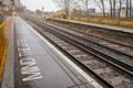 London, United Kingdom - February 01, 2019: Empty Rail tracks at Lewisham station on rainy day. Trains are used widely for public