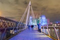 London, United Kingdom, February 17, 2018: long exposure of people walking and taking photos on Queen`s Golden Jubilee Royalty Free Stock Photo