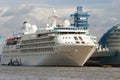 London, United Kingdom - February 25, 2010: ocean liner on water. Cruise ship on cloudy sky. Summer vacation concept