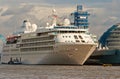 London, United Kingdom - February 25, 2010: ocean liner on water. Cruise ship on cloudy sky. Summer vacation concept