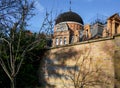 London, United Kingdom - February 02, 2019: Royal Observatory Greenwich building dome founded 1675 with sign near entrance on Royalty Free Stock Photo