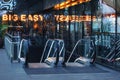 London, United Kingdom - February 03, 2019: Yellow neon letters sign on Big Easy restaurant window at their Canary Wharf branch.