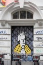 London, United Kingdom: A graffiti of the Royal Queen in yellow dress in Soho