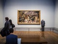 London, The United Kingdom - Visitors looking at paintings in the National Gallery.