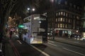 Bus circulating at night in London, England, United Kingdom