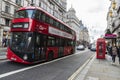 Red bus circulating in London, United Kingdom