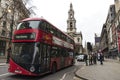 Red bus circulating in London, United Kingdom