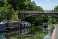 Boats in Little Venice canal area, home to waterside cafes pubs and houseboats Royalty Free Stock Photo