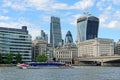 A City Cruises tour boat sails on the Thames River near London Bridge Royalty Free Stock Photo